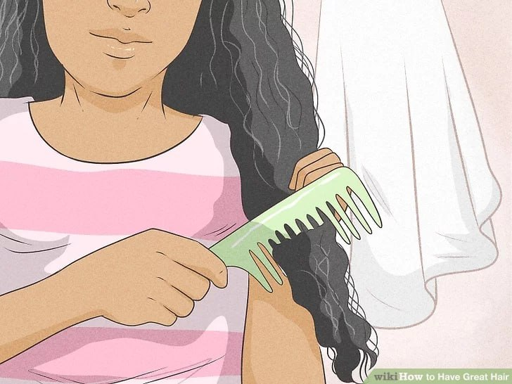 You’ve probably noticed that combing your curly or textured hair creates frizz. The best time to comb it is actually while you're in the shower. With the conditioner still on your hair, use a wide-tooth comb to work out any knots or mats.
