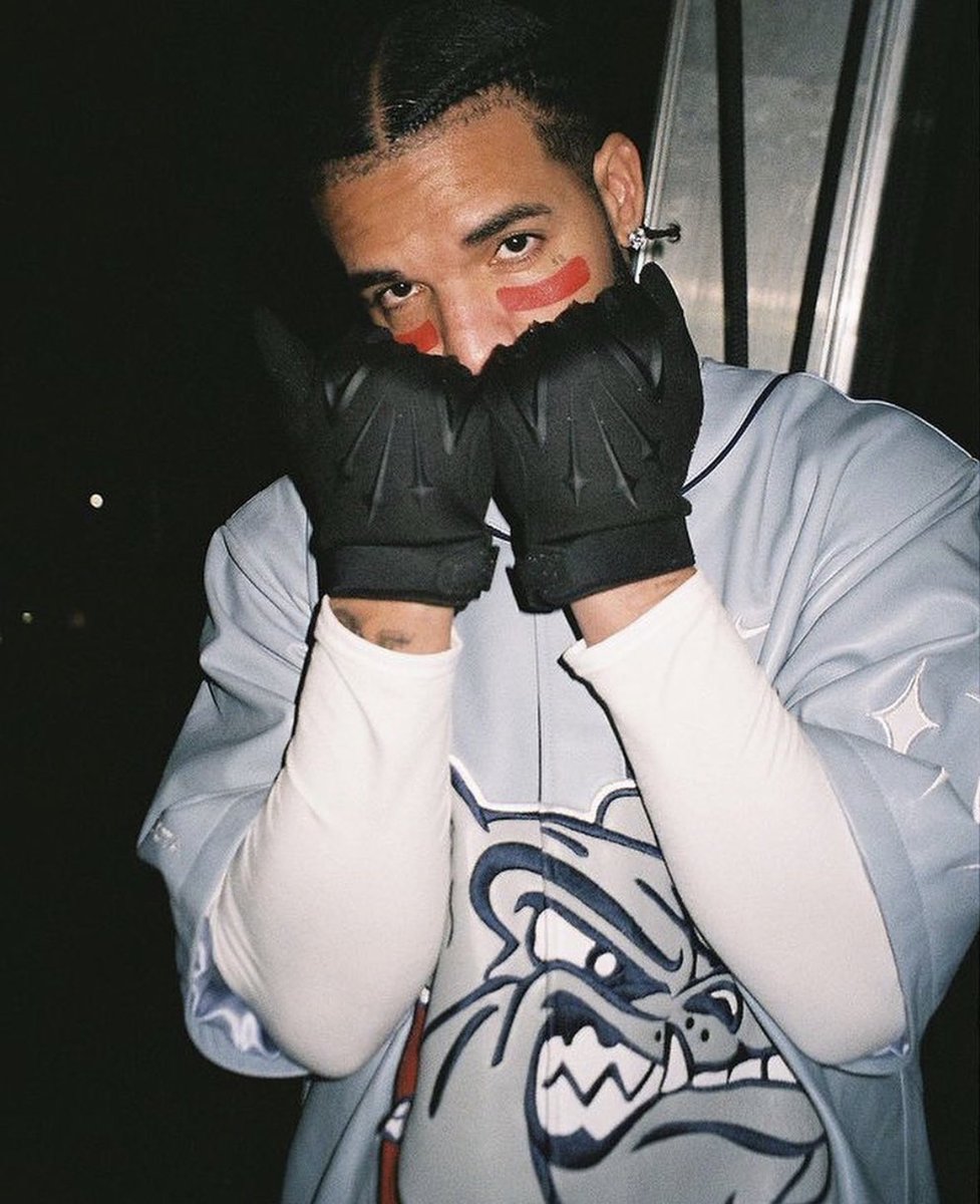 DrakeDirect's tweet photo. Drake in his custom Dreamville x Nocta jersey https://t.co/k2cTqm398R