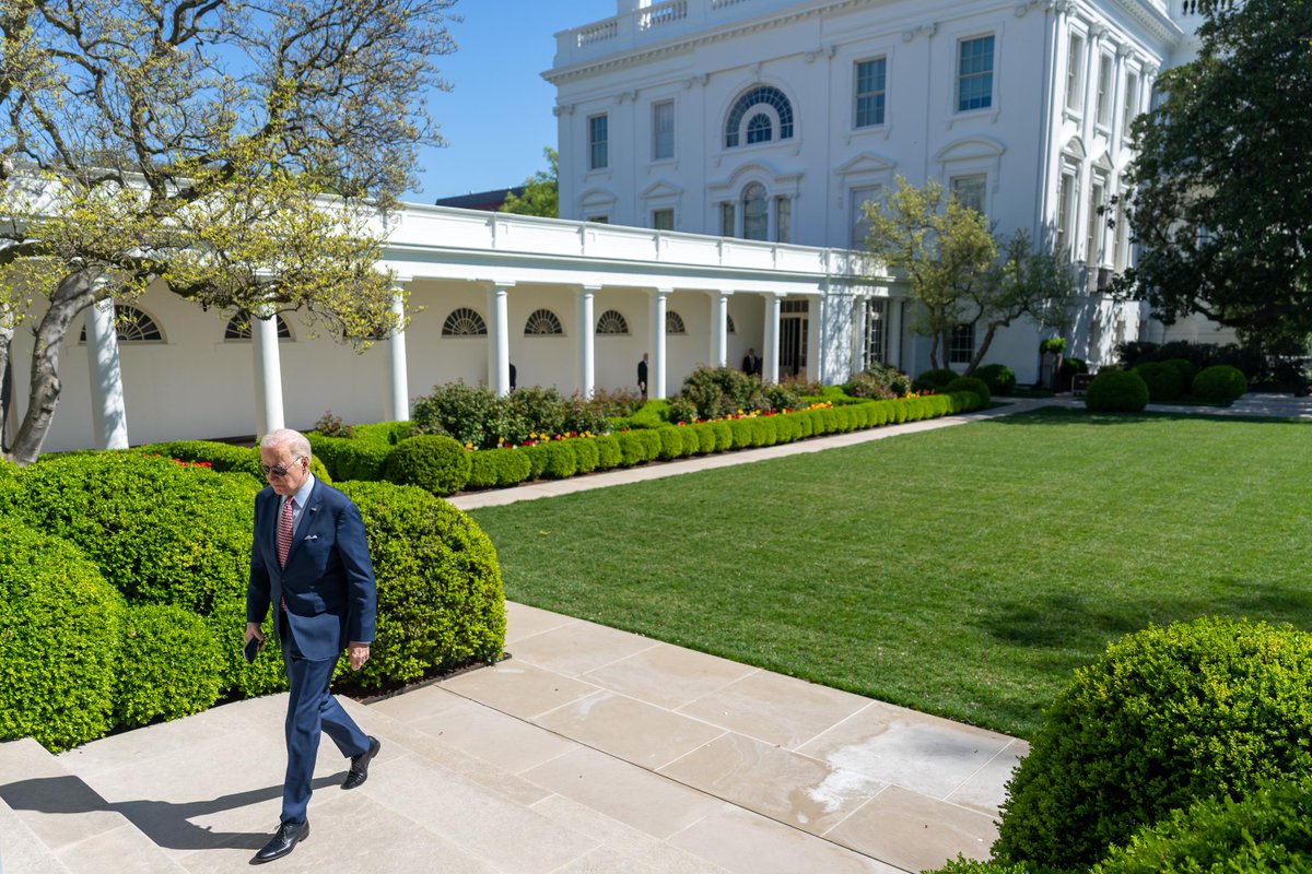 President Biden walks through the Rose Garden to the Oval Office on April 4, 2023.