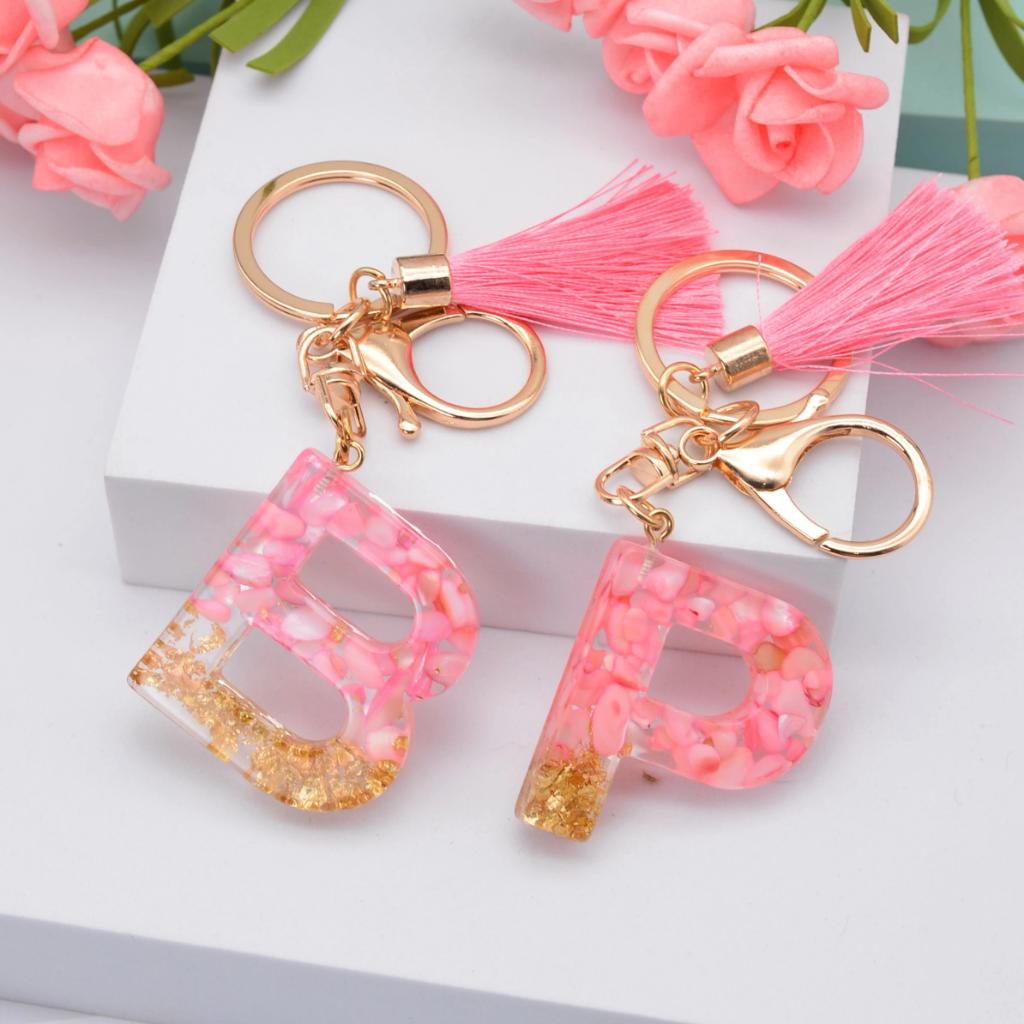 ChiveyaJennifer's tweet photo. Hie Guys , Get yourself or someone special one of these Exquisitely Elegant Initial Letter Keychain with Pink Pebbles and Gold Foil, Keychain Ring with a complimentary Tassel.

Contact me using the link below. 👇

https://t.co/ls2hzAd5Yw https://t.co/lnPjYtjAXO