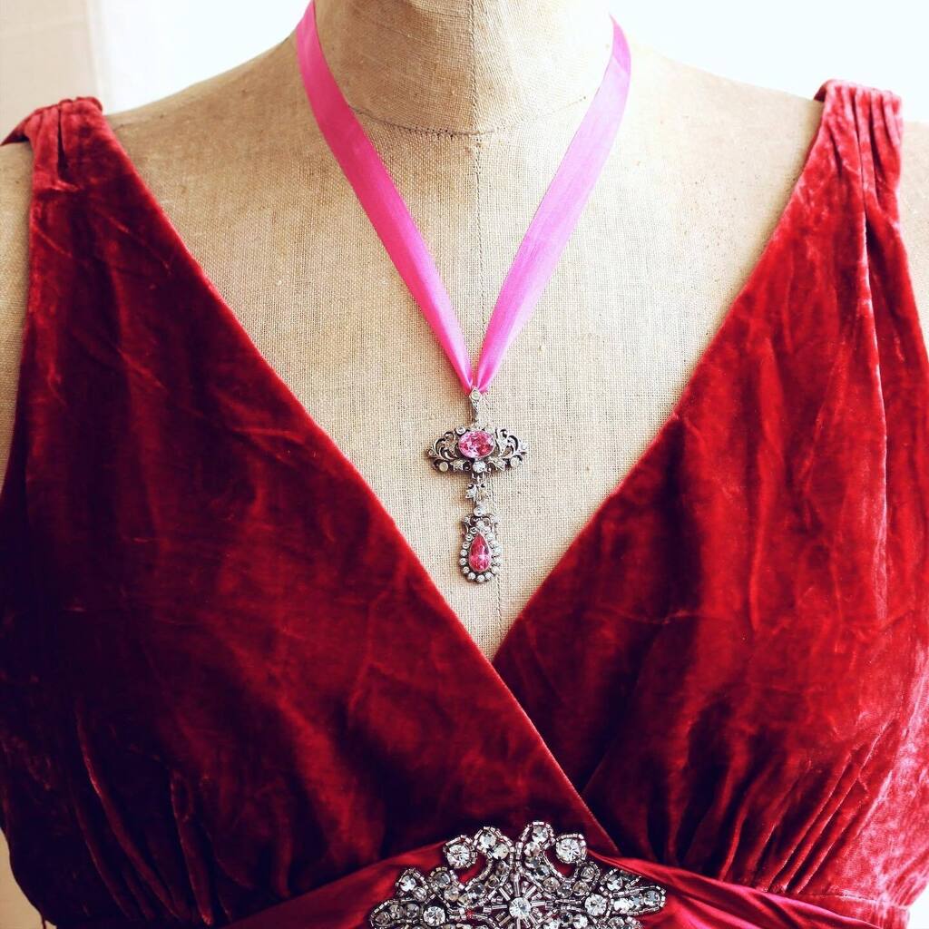 Beautifully be-ribboned! An #austrohungarian revival pendant set with scorching hot pink Pastes, as worn at dances and parties back in the day… £395 #antiquependant #vintagependant #lovevintagestyle #bevintage #reuserevolution #ethicalluxury #austroh… instagr.am/p/CqpKAmMoh2X/