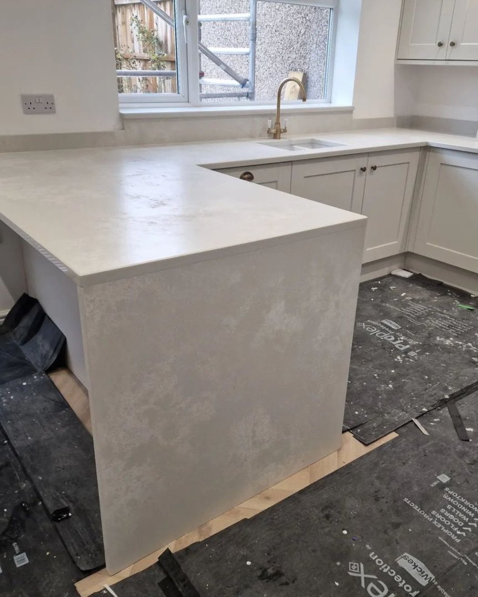 Thinking about a waterfall edge in your kitchen?  This one featuring Lumina Stone Coral Naturale quartz is a beautiful example@LuminaStone