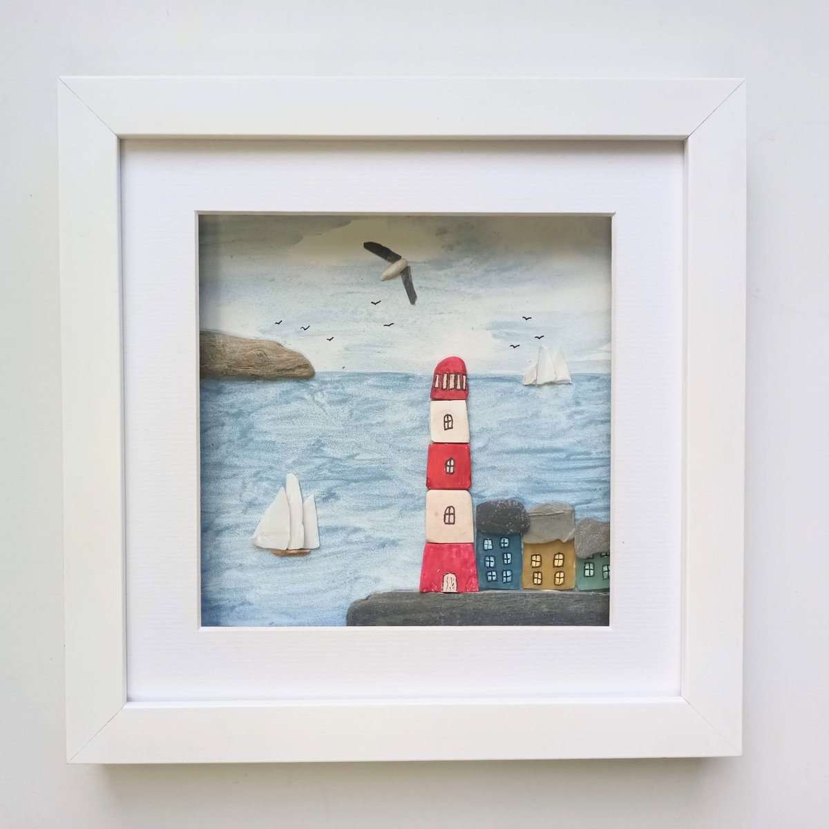 Beachstreetart's tweet image. Beachcombed art - sea pottery lighthouse, sea glass cottages and sea shell sailing boats in a 24cm frame. #beachcombedart #seaglass #seapottery #lighthouse #coastal #wallart #cornwall etsy.com/uk/beachstreet…