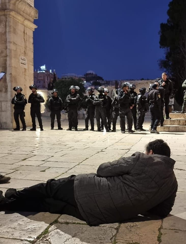OnlinePalEng's tweet photo. A Palestinian youth defies Israeli occupation forces at Al-Aqsa mosque courtyards. https://t.co/UlDLLqoySg