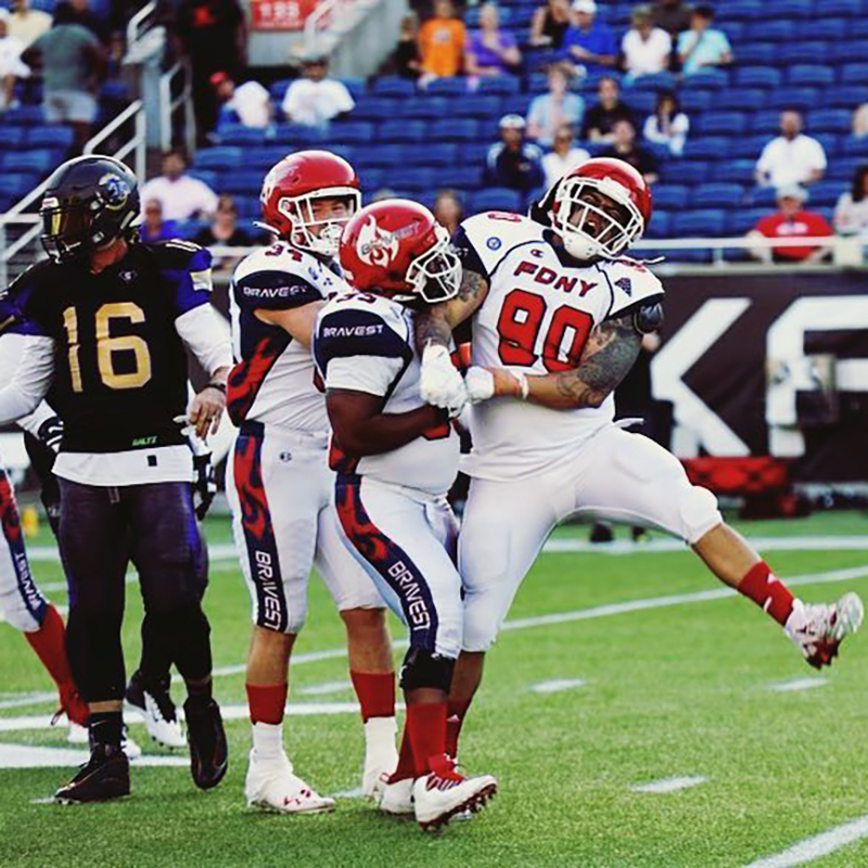 SafrSports's tweet photo. FDNY @BravestFootball is all fired up after their first win of the season! They’re wearing their game-ready #SAFRProTech helmet covers. Hard to tell, right? #SaferThroughScience 🔥🏈 https://t.co/hUUT9LEaaC