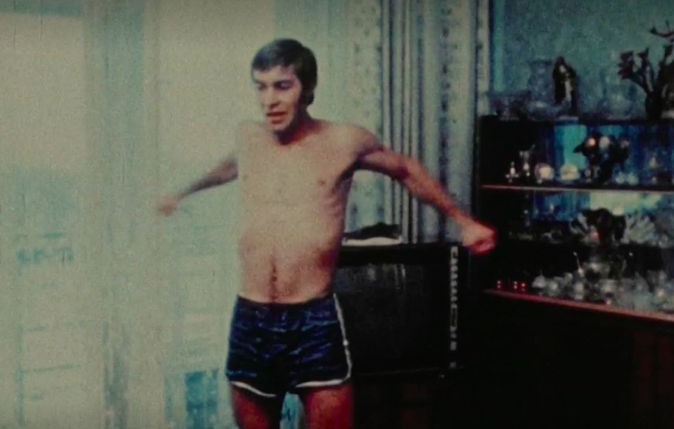 Summit72Doc's tweet image. Director @nickdepencier&apos;s favourite scene: &quot;It&apos;s everything you could want to tunnel into the past: newsreel voice-of-god narration, grown men looking ridiculous in their underwear, an expert expounding on fitness while smoke from his offscreen cigarette wafts through the frame.&quot;