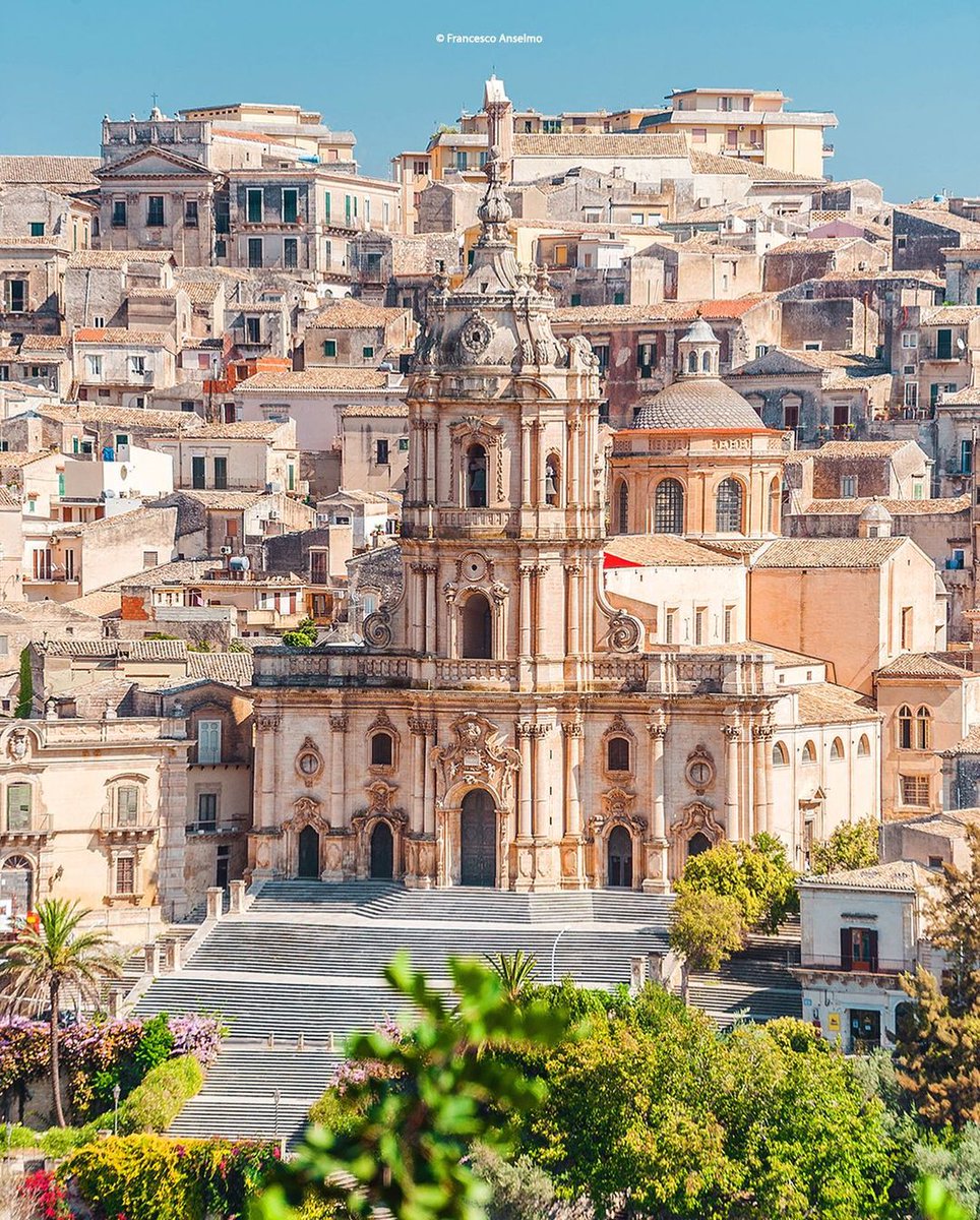 Modica is a golden city in Sicily. Known as the city of chocolate, you can explore its authentic soul by strolling around its narrow alleys, looking for the most beautiful views.

📍@VisitSicilyOP 

📷 IG  anselmoeditore

#LiveItalian #ilikeitaly #YourItalianPOV #modica #duomo
