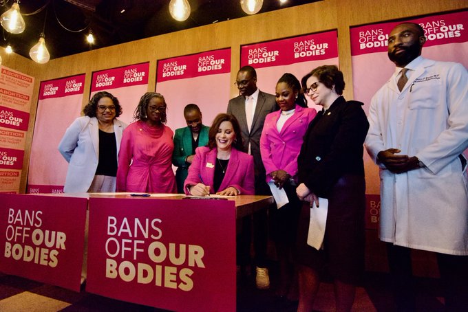 Governor Gretchen Whitmer signing a repeal of Michigan’s 1931 abortion law.