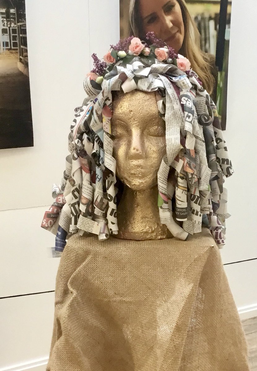 SusannaBrandon's tweet photo. New display in the 1894 Gallery @MyerscoughColl saw  level 2 #florists get creative with recycled papers. In line with college value of #sustainability, students constructed a @FollowWestwood inspired gown and wigs to display fresh flower Alice bands! #Loveourcolleges #JoyFE💛 https://t.co/OoAsLAOG6A