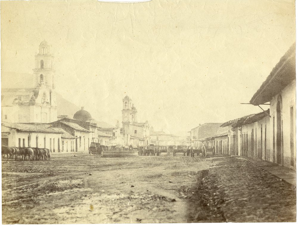 Cuauhtemoc_1521's tweet photo. Así lucía Puebla en el año de 1863 después del terrible sitio que sufrió por el ejército francés del 16 de marzo al 17 de mayo del año mencionado. Estas fotografías fueron realizadas por un miembro del ejército invasor de nombre Louis Edouard Rousell durante la ocupación francesa. Reconocen cuál es la calle de la segunda imagen? Cuáles serán esas torres de templos? Los Leo