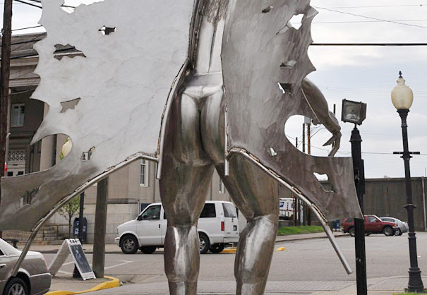 Also why did they give that one Mothman statue such a thicc booty?