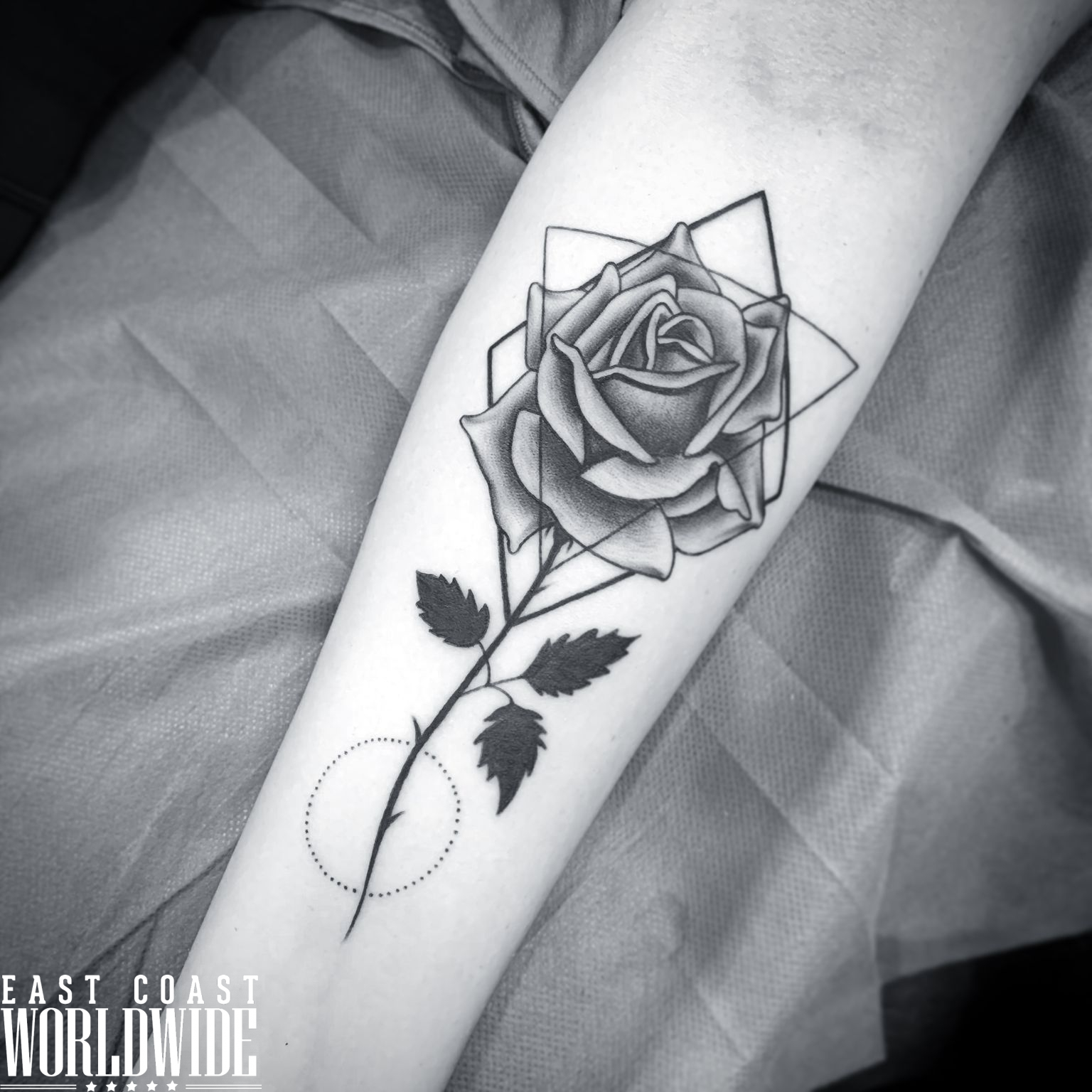 Premium Photo | A black and white rose tattoo design with a geometric  background generative ai