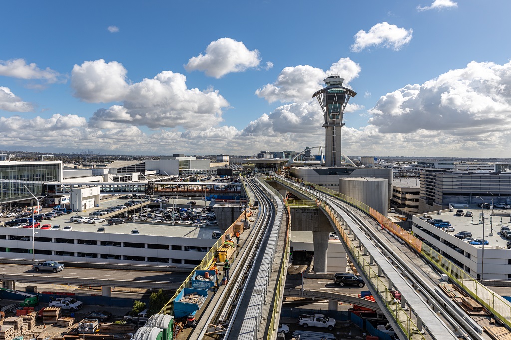 flyLAXairport's tweet photo. The latest views of the LAX People Mover train are now up on our construction gallery. With many external components nearing completion, the People Mover train's CTA stations are preparing for energization. 
For more photos visit: https://t.co/VJ1ypeglbl https://t.co/pLFluu9qMX