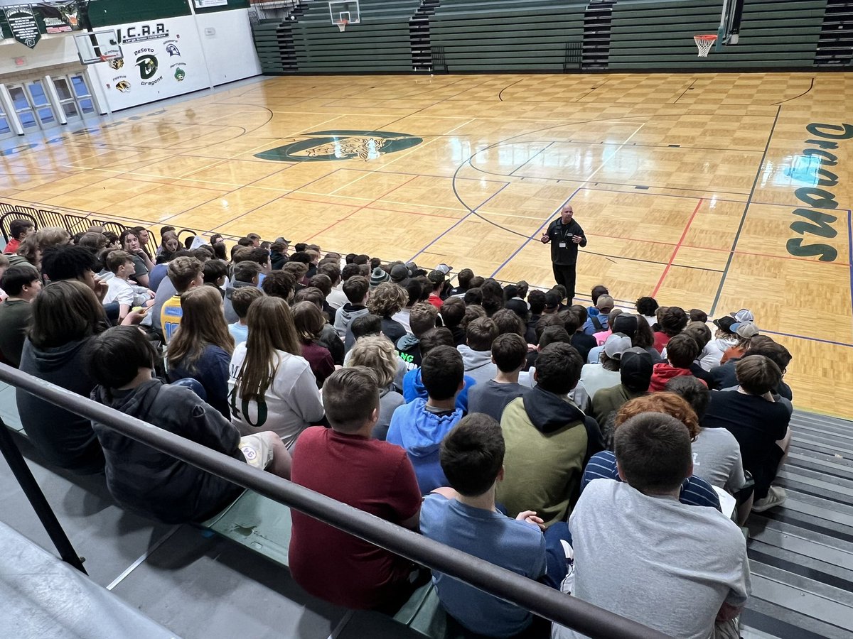 New De Soto Dragons head football coach, Russ Schmidt, having his first team meeting  with members of the football team.  Great message about what does “A Dragon State of Mind” mean to you.