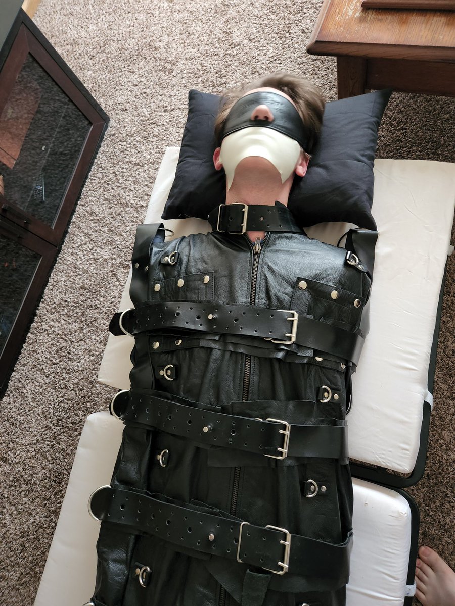 sockbondage23's tweet photo. Forgot to post this fun session I had with @HogtieG a while ago. Palette-wrapped, vet-wrapped, and strapped into my leather sleepsack, it was the perfect way to spend my morning 🤩

🪢&amp;📸: @HogtieG
#bondage #sleepsack #mummified #socks #sockbondage #gagged #tapegagged https://t.co/kZ2Hxsqsar