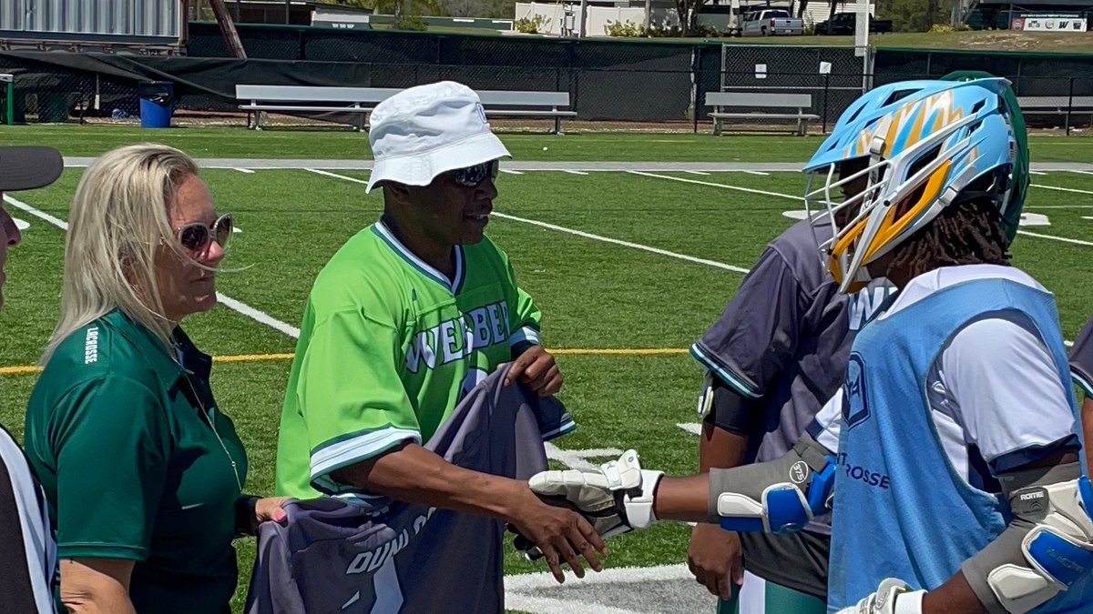 LaxWebber's tweet photo. First class @PointMensLax Captains greeting the family of Saxton Dunlap at midfield during the captains meeting.   Saxton's #2 Jersey is presented at every home game for the Warriors and special today as @giftoflife Swab for Saxton day so Kristy and Alan did the honors https://t.co/4upuTRlbDK