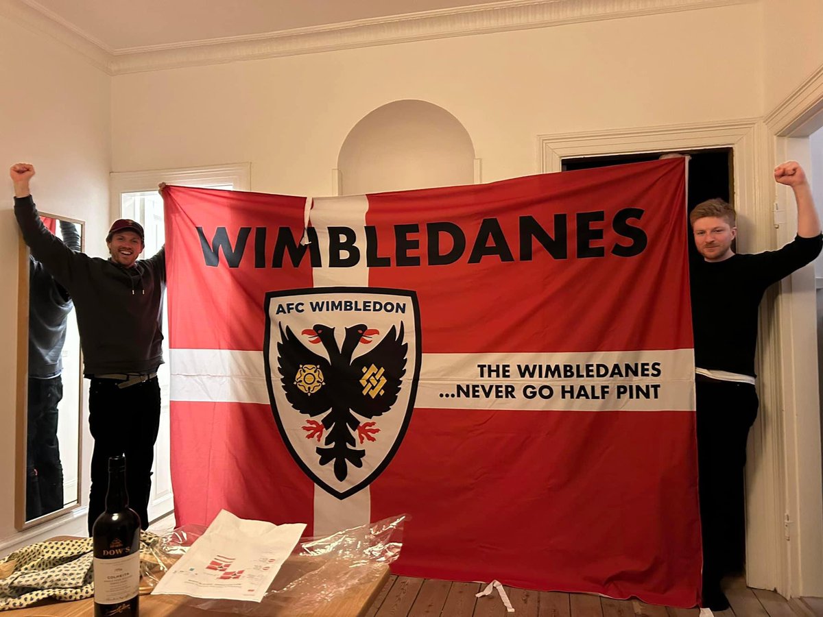 Benjaminskjold's tweet photo. New flag has arrived! @AFCWimbledon #wimbledanes #nevergohalfpint https://t.co/AXlI4s4UNV