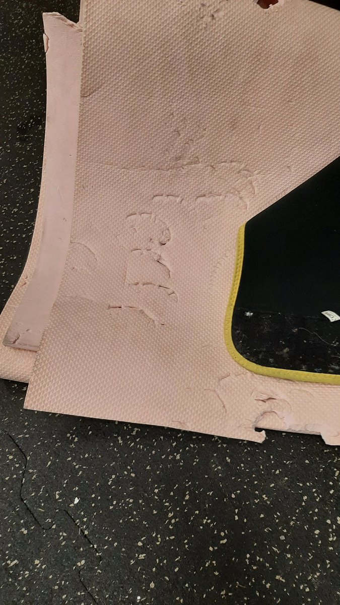 Who's at the public gym eating their mat