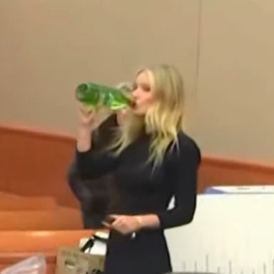 vulture's tweet photo. The court was in recess as Gwyneth took a sip of water from a giant bottle of what appears to be Glass Spring Water https://t.co/53MCwXGO1L