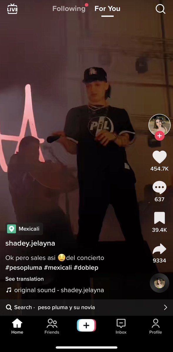 oblejeas's tweet photo. peso pluma wearing a PiL shirt is equivalent to morrissey wearing a Chivas jersey https://t.co/2ypn0oaNF9
