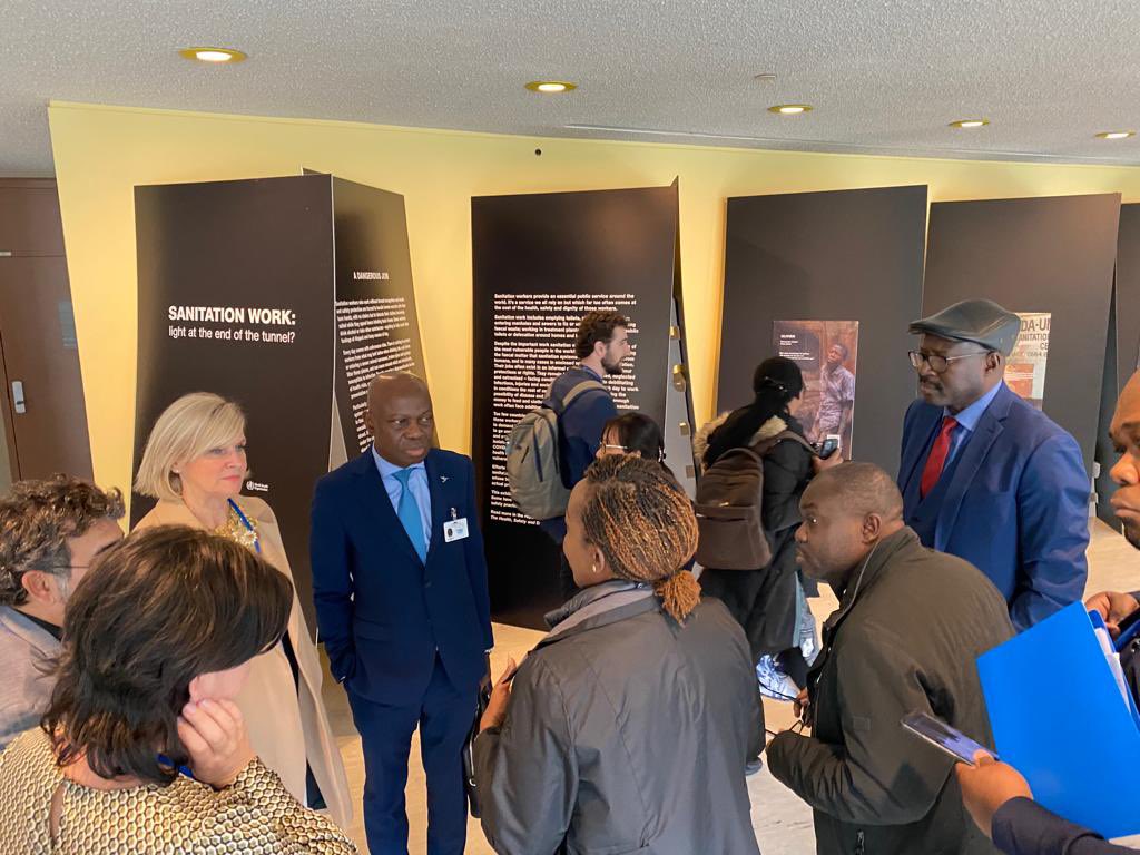 DrMariaNeira's tweet photo. Sanitation workers are often invisible,  even if they provide invaluable services. Provoking exhibit to reflect about their safety, health and dignity. A pleasure to open it with  @GilbertFHoungbo @ilo and the @WHO WASH team. #UNWaterConference2023 https://t.co/xY6mGTrnBA