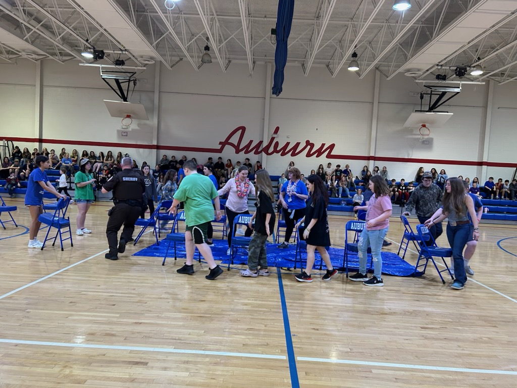 What an awesome day for a PEP rally.  The end of the 9 week celebration was a hit…musical chairs, basketball students and staff, and pies in the face.  Oh my!  EAGLES working hard and playing hard.