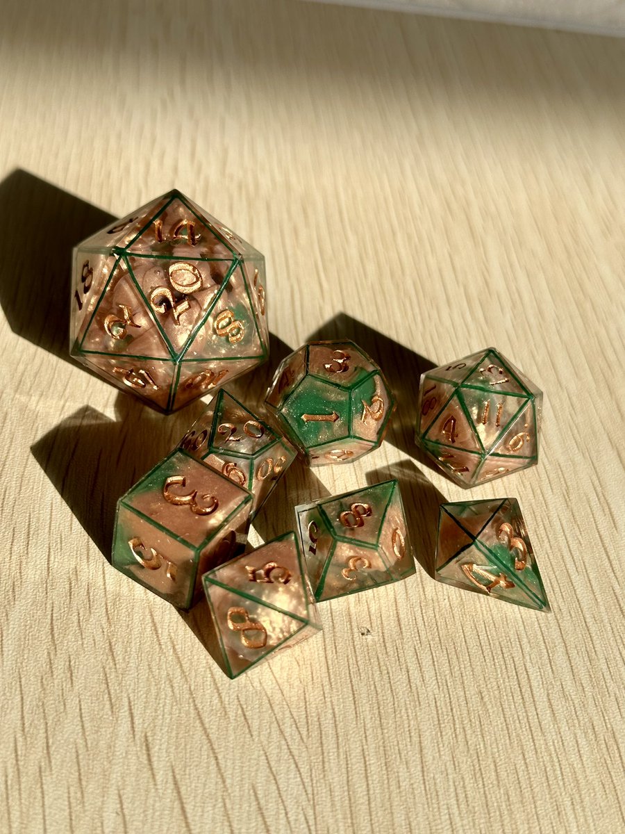 MapleMothDice's tweet photo. I will be using rose gold paint so much more after this. Jfc it looks SO GOOD. F.R.I.D.A. Inspired dice set going up tonight in the shop along with a bunch of others! Thank you again @navarroc0821 for the most inspiration I’ve had in months. ✨🌹#polyhedraldice #handmadedice https://t.co/Kw2YnVWZNc