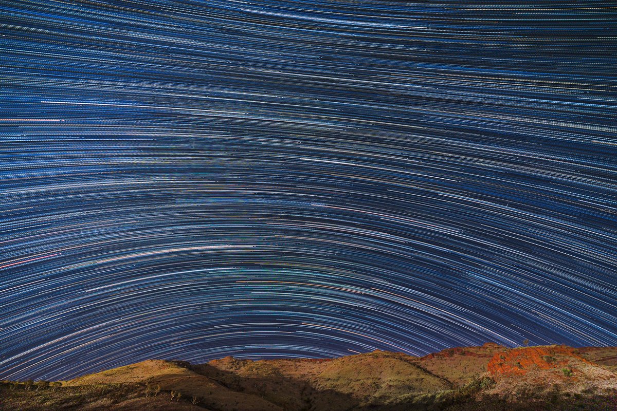 From tomorrow’s video startrail over the packsaddle hills. 3 mins for the hills in foreground iso 800 . 152 shots over 2 hours blended at 30 secs iso 1600. 
#startrails #nightscape #pilbara #astrophotography #3leggedthing #canonaustralia #nisifiltersanz #gothere #kuhl