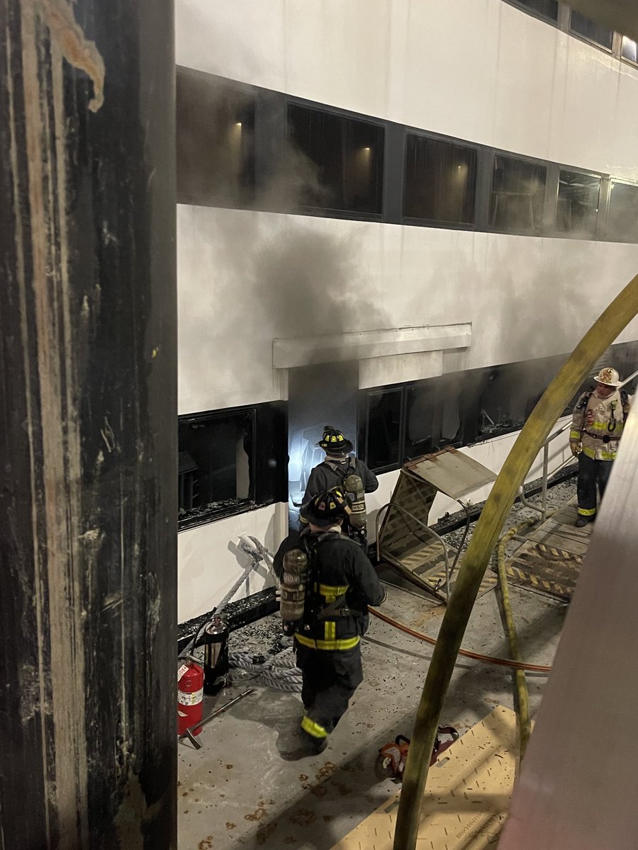 BostonFire's tweet photo. Heavy black smoke has filled the Spirit of Boston from the lower levels . Companies are working from the dock, within &amp; the water to extinguish the fire. https://t.co/fidy2rCVdo