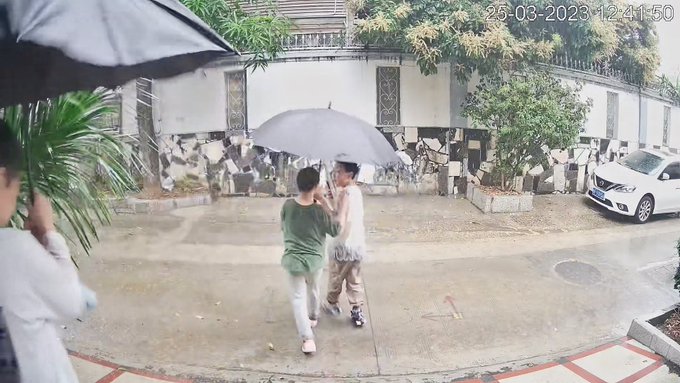 First downpour in weeks so come kids took shelter in my doorway. It will be raining for hours for sure