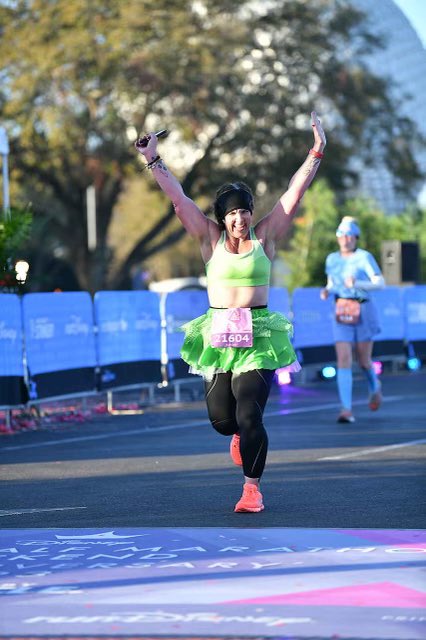 surfer6girl's tweet image. This picture means so much to me seeing my kid as I am about to cross the finish line for my half marathon last month! Dreams and goals can happen when you are determined! @runDisney thank you! #FairyTaleChallenge #19.3miles 💚