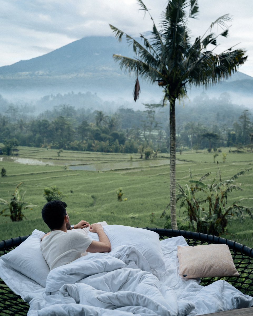 JanikRai's tweet photo. Woke up to the sounds of birds and crickets with a view of rice terraces and mt. Agung. One of my favourite views I’ve woken up to! https://t.co/AKvzFtw8gN