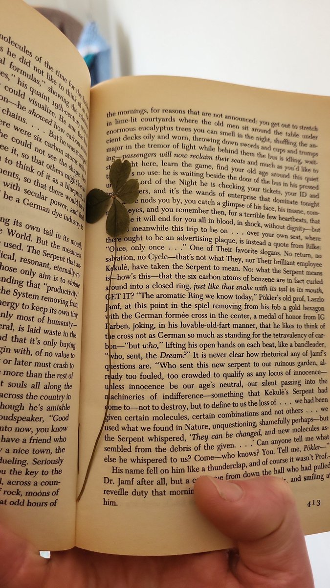 Jr48395582's tweet photo. @wastemailing @Dalkey_Archive @SchmidtStiftung @arnodaily Opened my old copy of gravity’s rainbow and there was a 15 year old four leaf clover I'd found whilst reading it https://t.co/QACy3VEoor