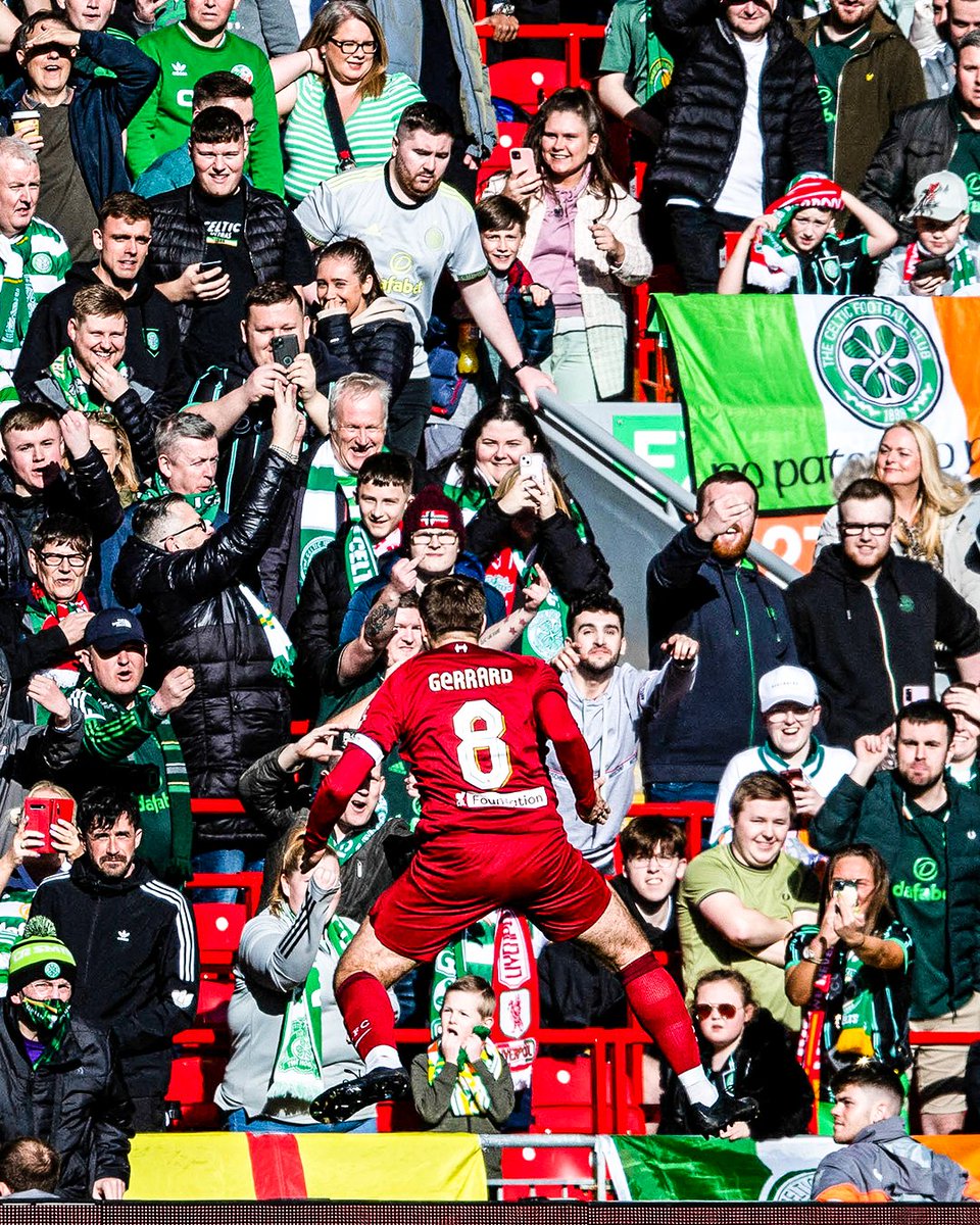 brfootball's tweet photo. Steven Gerrard celebrates in front of Celtic fans after scoring a penalty at Anfield in a charity match. 

He won the Scottish Premiership in 2021 as Rangers manager 😈 https://t.co/Ff9upBJCAL