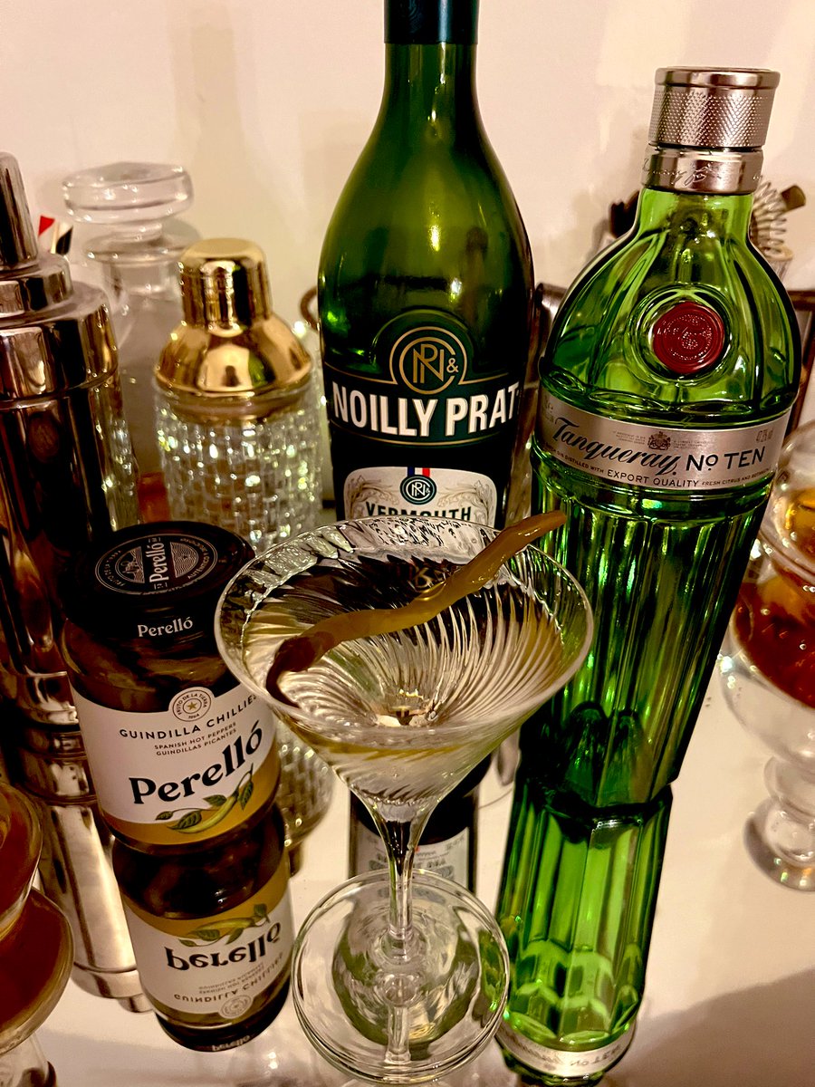 JamesOHP's tweet photo. A #SaturdayNightCocktail with @angela_clutton - a Gin Martini with Tanqueray No. 10 with @NoillyPrat with a chilli from Perello. https://t.co/Zc3LRsx60j