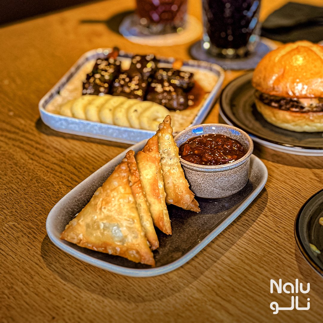 KsaNalu's tweet photo. Indulge in our latest addition, the "Angus Samosa" - a delectable blend of flavors in each and every bite. Only available at Nalu Restaurant and for the first time ever, this dish is sure to satisfy your cravings. https://t.co/v2T53r2dQ9