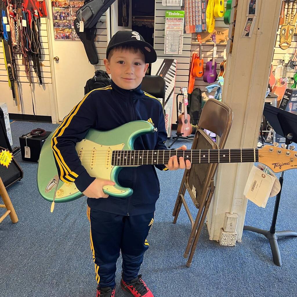 Maxwell, rockstar in training!  #guitar <a href="/tagimaoficial/">Tagima </a> <a href="/tagimausa/">TagimaUSA</a> #rockatar #shoplocal instagr.am/p/CqOHDvXLW4E/