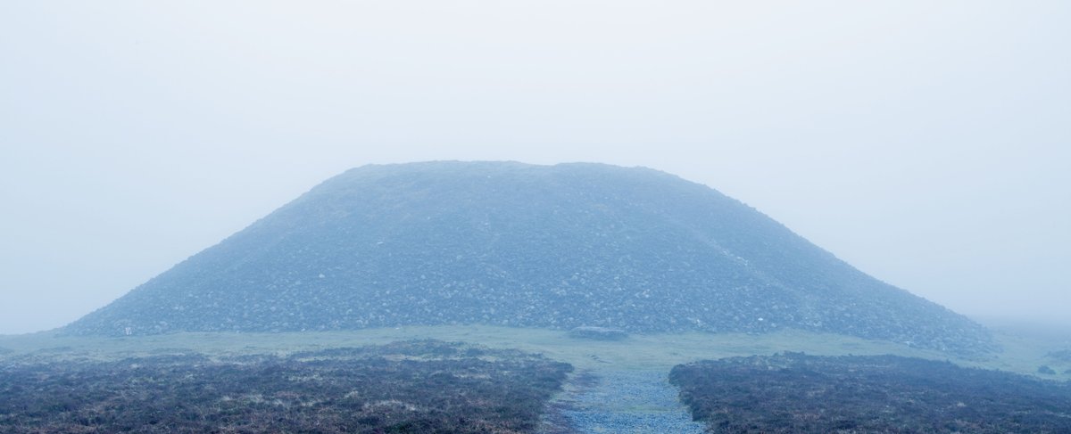 PicturesEden's tweet photo. On Thursday I scaled #Knocknarea before dawn. The weather was forecast clear at sunrise so I thought I’d try for a cheesy sunrise over the cairn photo. Of course, the weather wasn’t clear at the top but still some nice pics

1/3 - Misty top 

#ChooseSligo #Sligo #DiscoverIreland https://t.co/iNLRv15z0D