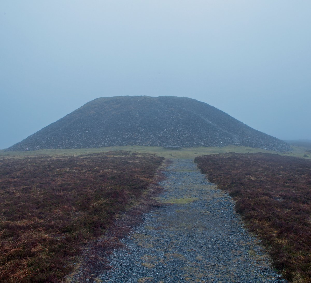 PicturesEden's tweet photo. On Thursday I scaled #Knocknarea before dawn. The weather was forecast clear at sunrise so I thought I’d try for a cheesy sunrise over the cairn photo. Of course, the weather wasn’t clear at the top but still some nice pics

1/3 - Misty top 

#ChooseSligo #Sligo #DiscoverIreland https://t.co/iNLRv15z0D