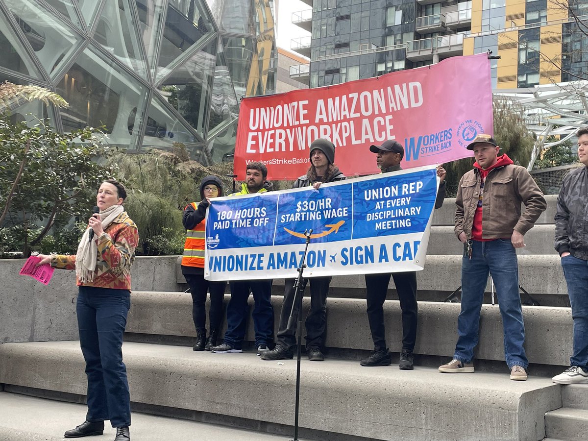 socialistem's tweet photo. Amazon workers from @AmazonUnionKCVG are rallying at Bezos’ doorstep, Amazon HQ. They’re fighting for $30/hr, 180 hrs PTO &amp; union representation. Amazon is trying to break their union. We need to build mass solidarity to fight back #UnionizeAmazonKCVG #UnionizeAmazonEverywhere https://t.co/s4hRkRvlGh