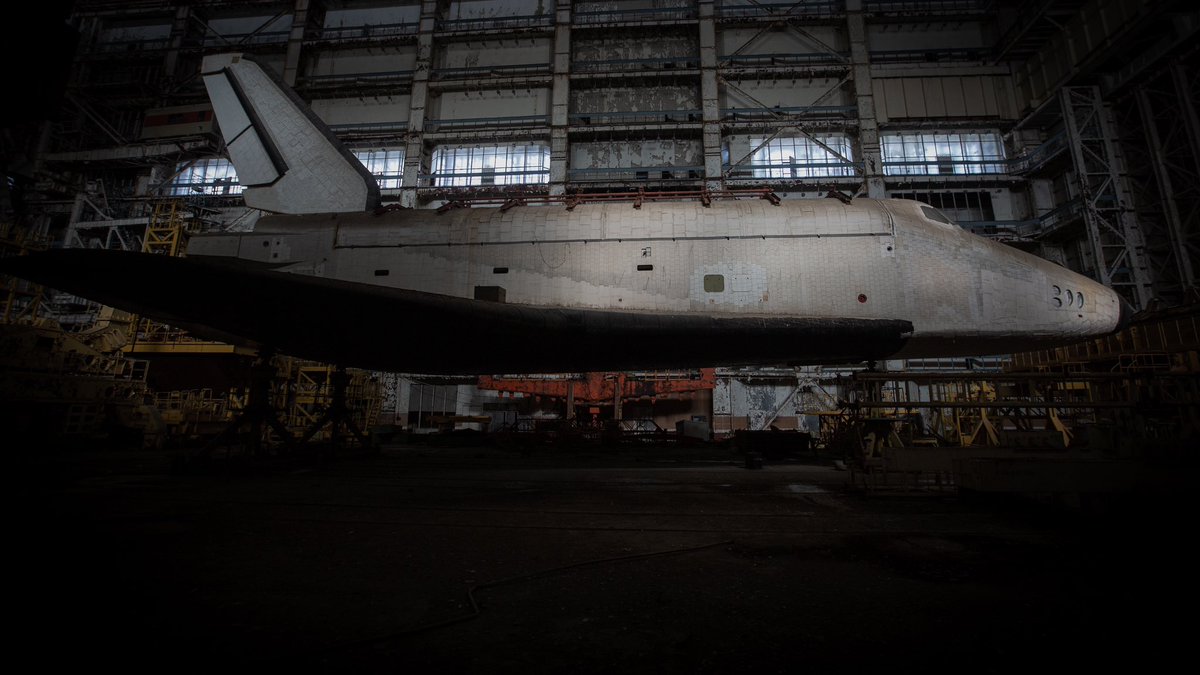 storyevtime's tweet photo. My photos of the abandoned soviet space shuttle Burya for @doxa_journal. The space shuttle project was one of the largest soviet undertakings but it was axed as the union fell apart. The two shuttles that were made fell into disrepair, one getting completely destroyed. https://t.co/Wj29UB7TUl
