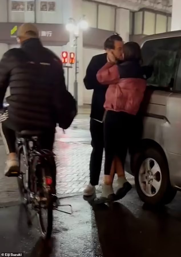 popcultureshub's tweet photo. Harry Styles appears kissing Emily Ratajkowski on the streets of Tokyo. https://t.co/UJ8kllhHWL