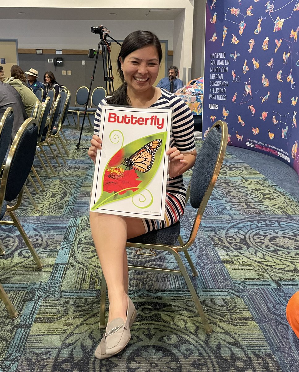Florcalero6's tweet photo. A friend of mine once told me that in another life I might have been a butterfly, because in this one, I am a social butterfly. 🦋😂 Well, today at the @happiness_fest held at @FIU BBC Campus, I got a big sign that says I might! 😂🤩 #BeHappy #WeAreFIU #worldhappinessfest https://t.co/WX54ppedJ5
