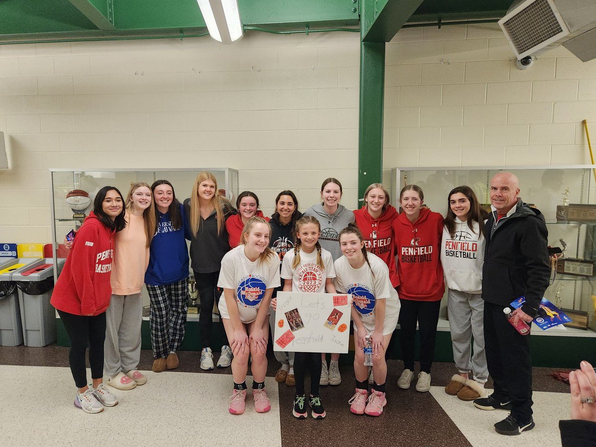 Jackie and Grace representing at the Ronald McDonald game with their teammates and super fan and future Patriot Lucy