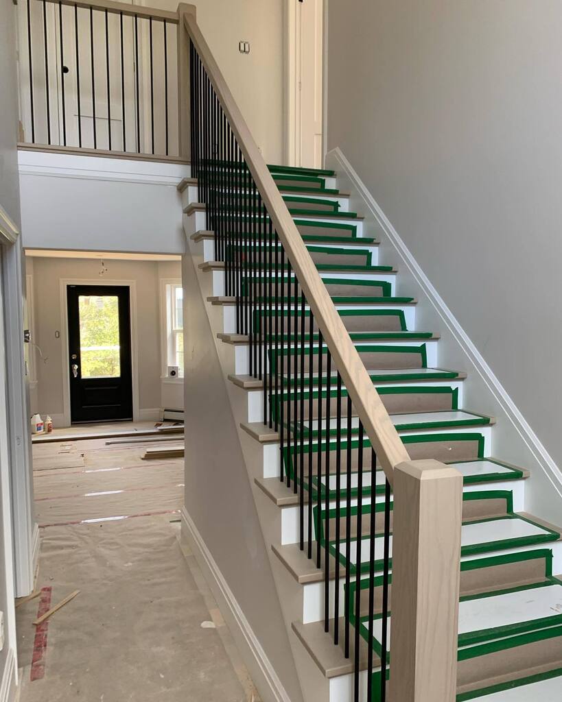 Stairs now completed at Project Lakemist .  White oak to match the flooring with simple black spindles .  Clean contemporary look.  #stairs #whiteoak @glstairways #timberlaneconstruction @kminteriors2063 instagr.am/p/CqOiOEtpPF0/