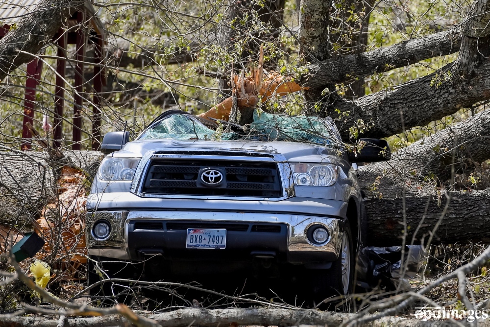 A pickup truck destroyed by downed trees the day after a tornado struck Amory, Mississippi, USA, 25 March 2023. At least 23 people have been killed after an overnight tornado and severe weather outbreak tore through Mississippi. 📷️ EPA / Thomas Graning

#Mississippi #epaimages