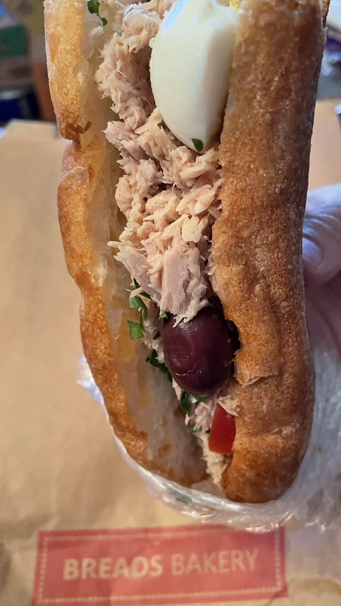 Tunisian tuna sandwich from <a href="/BreadsBakery/">Breads Bakery™</a> (minus a few bites).