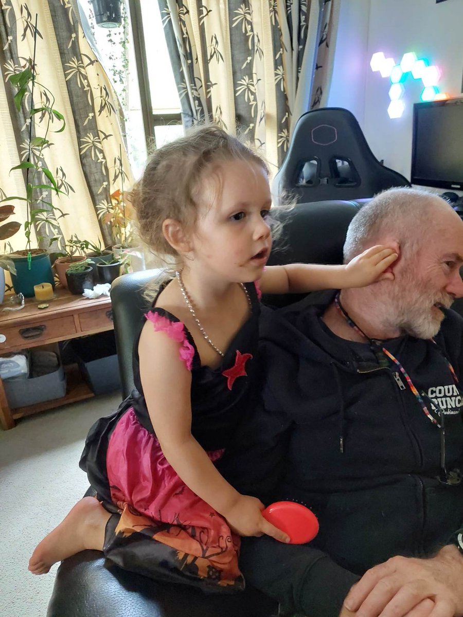 When your 3yo granddaughter decides she's going to "brush curls into your hair" whether you have hair or not...