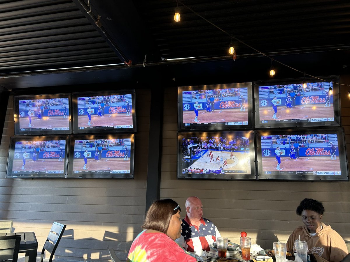 One thing I’ve learned about living in the south is that anything SEC is bigger than anything else.  At a restaurant with random SEC softball on seven TV’s and NCAA tournament on one.