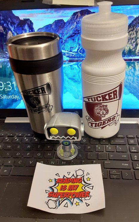 Thanks to Tucker High School for the swag from today's TigerCon. I like it. H.E.R.B.I.E. the Muse loves the Reading Is My Superpower sticker.

#TigerCon2023 #TigerCon #TuckerHighSchool